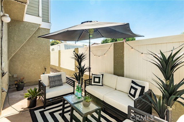 Private and spacious, side yard patio with dog run.