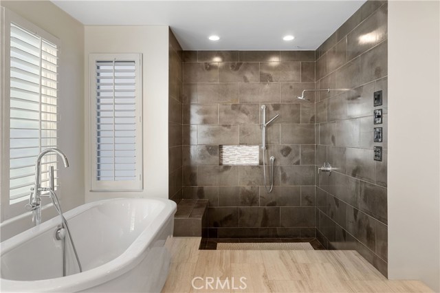 Huge spa-like shower in primary suite.