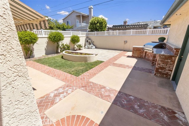 Beautiful custom pavers throughout yard and driveway