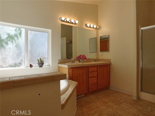 ...a shower and double sinks to expedite your routine!