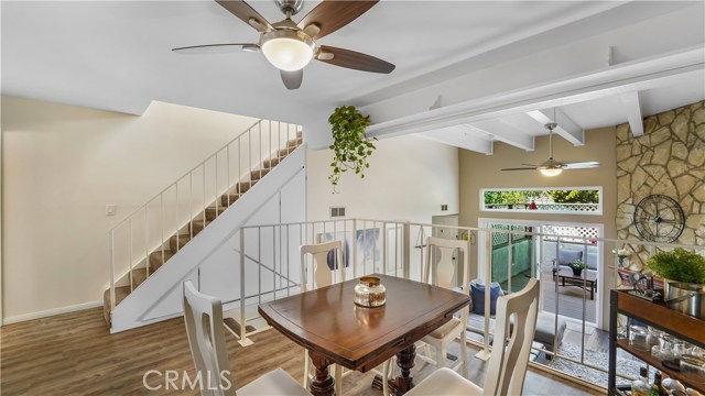 Dining Room with fan looking at stairwell