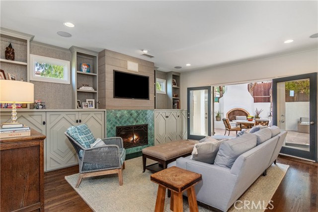 Family Room has custom cabinetry and tile treatment