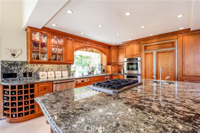 Oversized kitchen island with Viking 6 Burner cooktop.