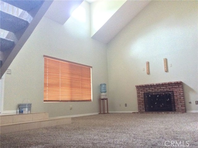 Living Room has vaulted ceilings with gable windows for bright, airy feel.