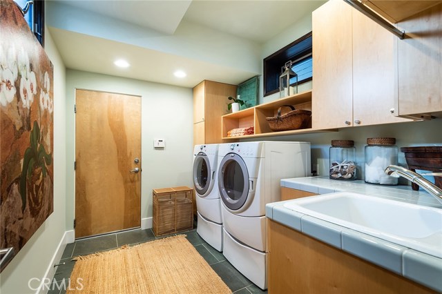 The laundry room leads to attached garage.