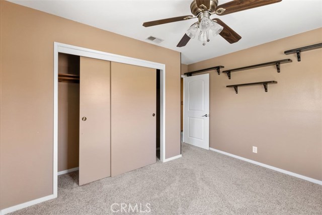 Upstairs bedroom with plush carpeting