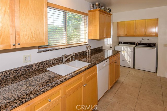 Kitchen has door leading to rear yard.