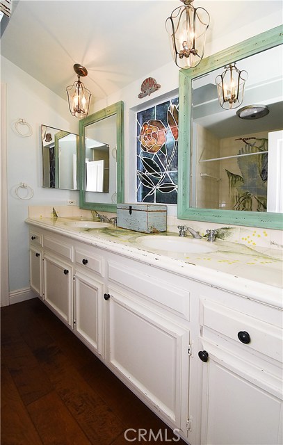 Jack and Jill bathroom with stall shower and separate tub in between Bedroom #2 and Bedroom #3 on first level