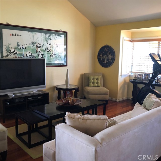 Spacious living room with an alcoved bay window!