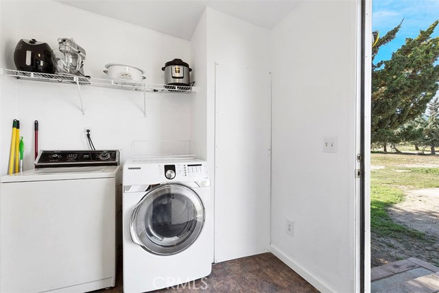 Separate Indoor Laundry Room at Back Entry