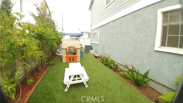 Back yard with hot tub.