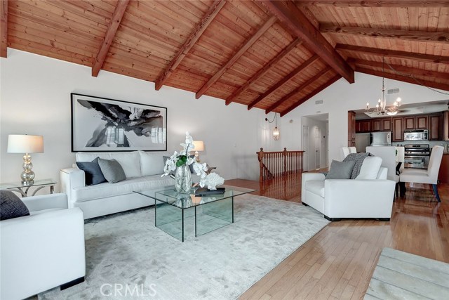 open floor plan with wood flooring