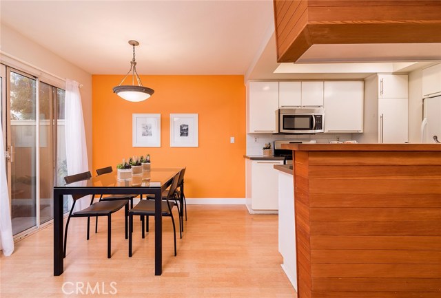 Dining and kitchen area with a cool vibe