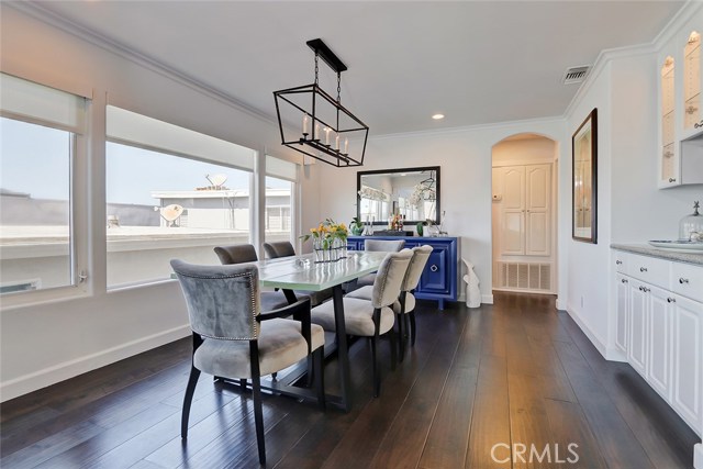 Formal Great Room/Dining Area with Engineered Hardwood Flooring.