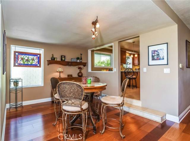 The well sized breakfast room adjoins the kitchen and has an obscure rain glass window providing light, as well as privacy.