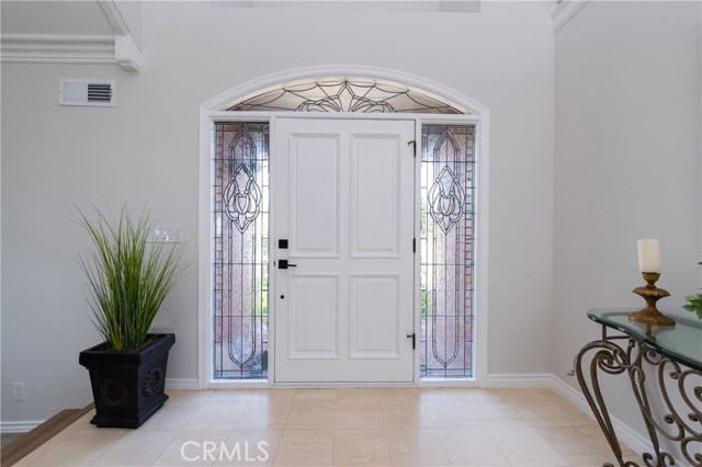 Stunning front entry door with leaded glass side lights!