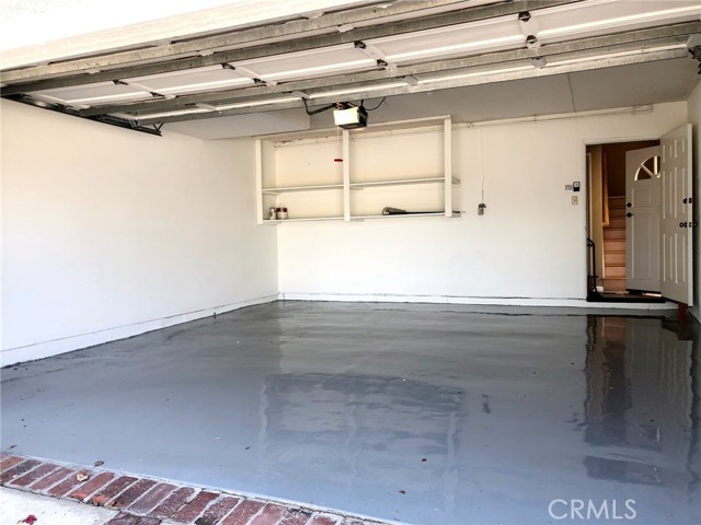 Freshly painted attached two car garage with direct access into the home. Additional two cars can be parked outside for visitors or tenant's own use.