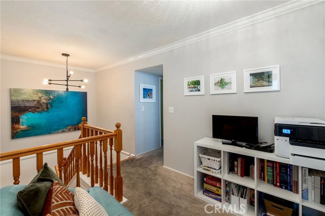 upstairs landing area perfect for TV room, play area, or home office