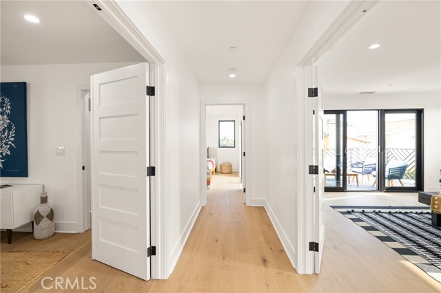 Broad Hallway Leads to Private Sleeping Quarters