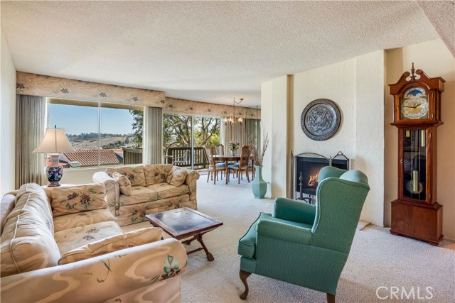 Open living and dining room with abundant light