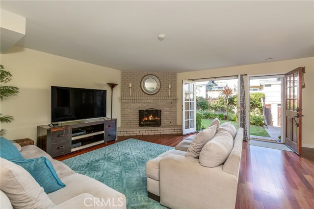 living room opens to private grassy yard