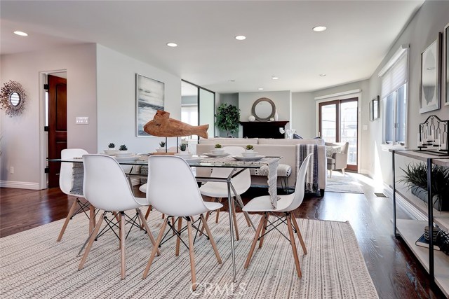 Enjoy seamless entertaining from the formal dining area to the living area with private balcony.
