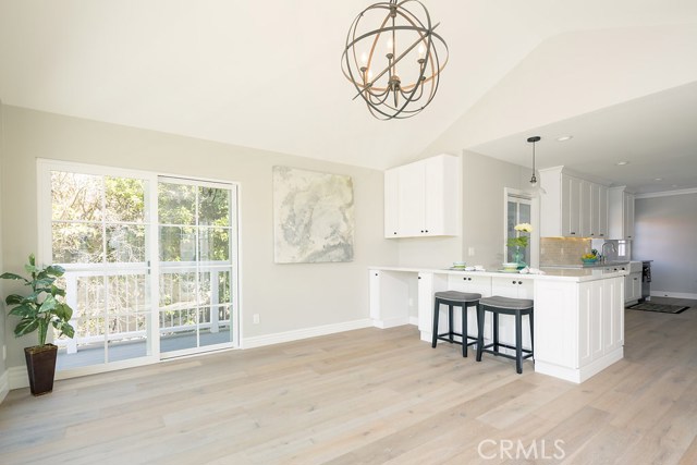 Spacious and light open floor plan in Dining Room, sliders open to wrap around decking