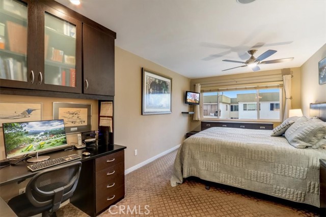 Primary Suite boasts comfy designer carpet and this brilliant built in desk with plenty of storage and still room for bed, dresser and side tables...GREAT space!