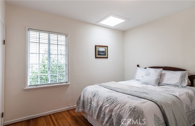 Bedroom #3 has skylight, hardwood floors and East facing window.