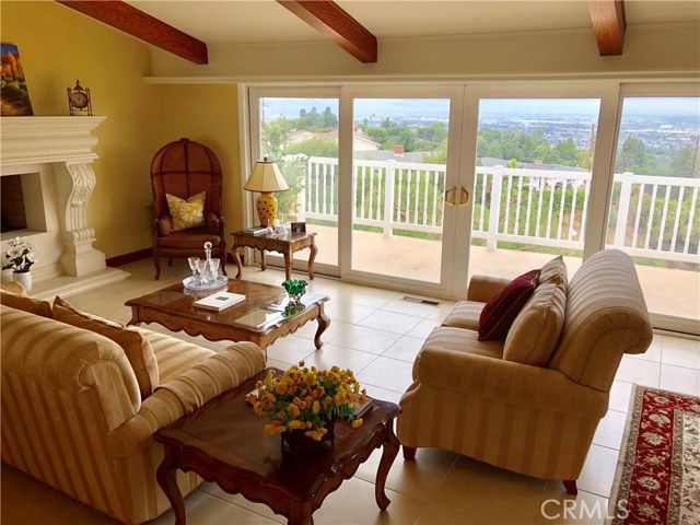 FORMAL LIVING ROOM: At Night when I walk from my Master Bedroom to the Kitchen I have Breathtaking Panoramic City Light Views from Santa Monica to Orange County Coastline and Sitting in my Master Bedroom /  dressing room / Formal Living room / Formal Dining room, I have the same views!! I recently removed all the Trees that obstructed my views.