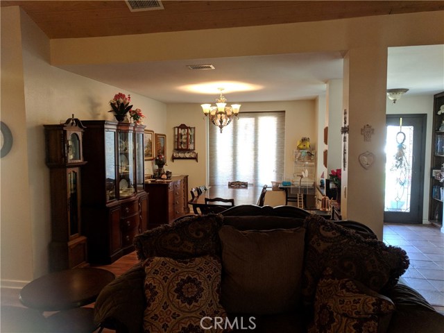 Living Room Adjoins Formal Dining Room