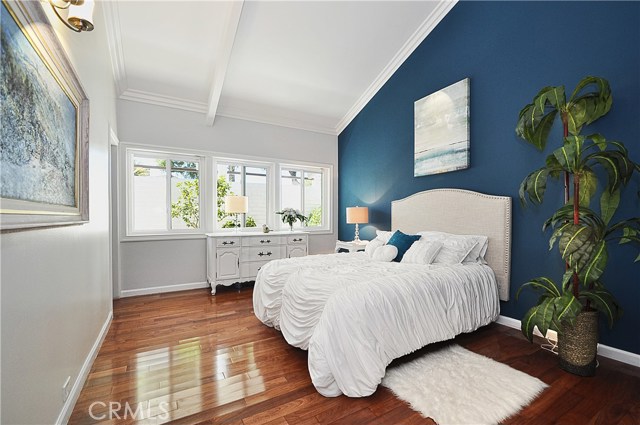 Bedrooms feature hardwood flooring and large walk in closets. This one is attached to a jack and jill bath complete with a steam shower.