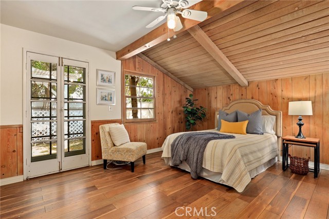 Back bedroom with lovely ceilings again and french doors that walk you out to a charming private patio off the side of the home.