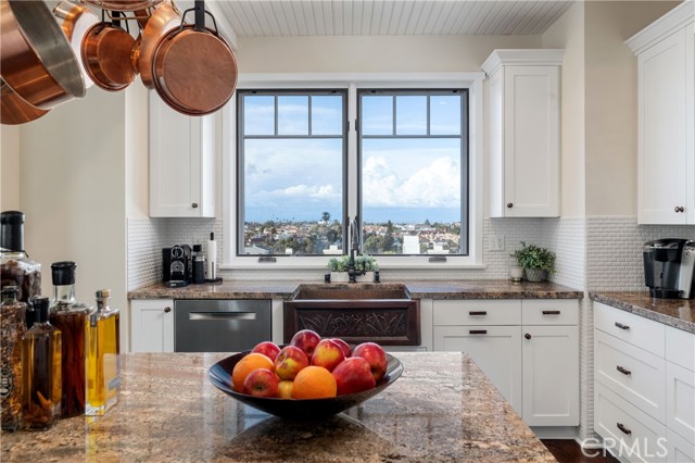 The view from the sink window is amazing!  Check out the beautiful copper farm sink!