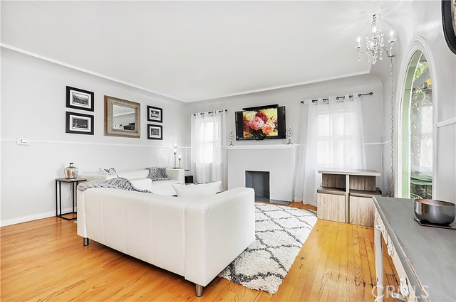 Living room with hardwood floors and fireplace