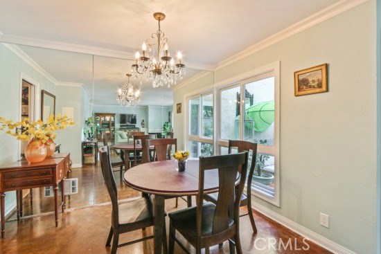 Formal dining area looking out to private garden patio