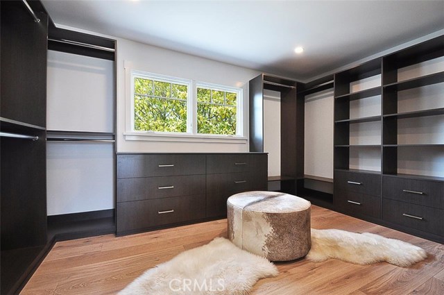 Oversize Walk-in Closet with Organizer in Master Bedroom