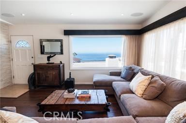 Living Room with picture window of ocean view