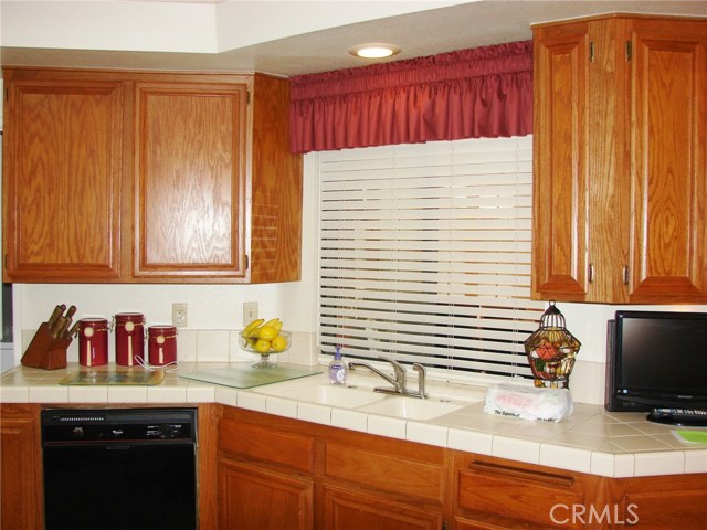 THERE'S SO MUCH COUNTER SPACE FOR FOOD PREP AREAS AND THE BUILDER ADDED PLENTY OF OUTLETS SO YOU CAN HAVE YOUR COUNTERTOP APPLIANCES TOO! THEN THERE'S THE CUPBOARDS GALORE!