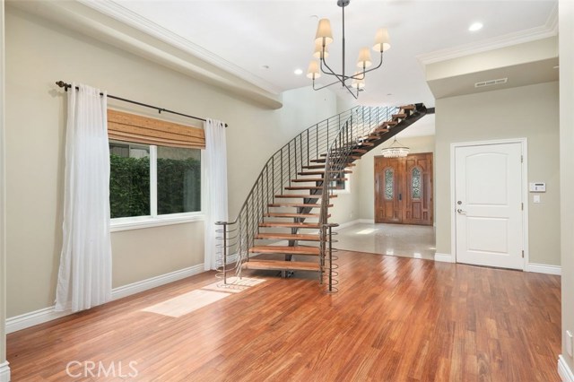 Stairway leading to second floor additional family room and three bedrooms.