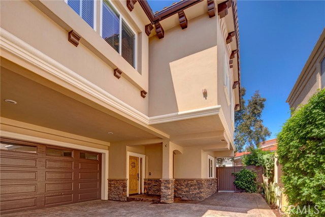Quiet and private back unit, 2 car direct-access garage, beautiful stone work and stamped concrete.