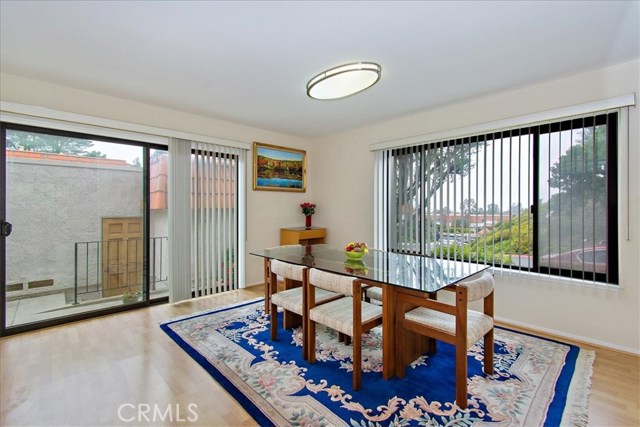 Dining room with private patio between house and 2 car garage Dining room with private patio between house and 2 car garage