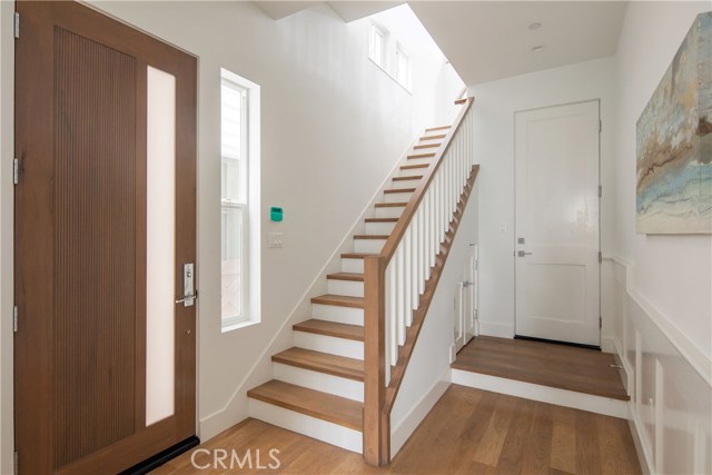 STAIRCASE TO 2ND LEVEL, ENTRY FROM GARAGE