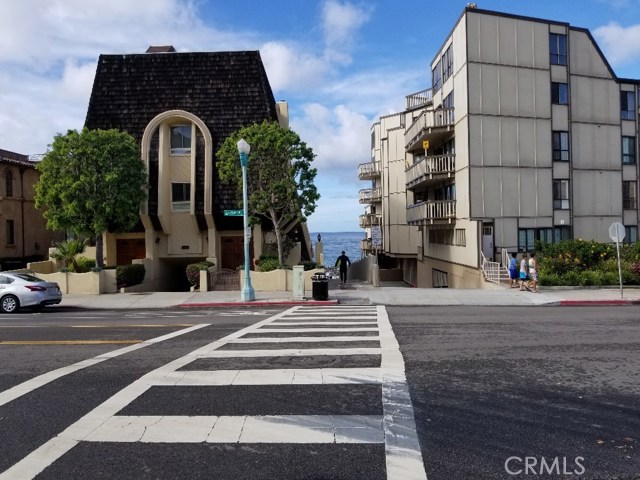 Entrance to the beach from the corner of the subject complex across the street