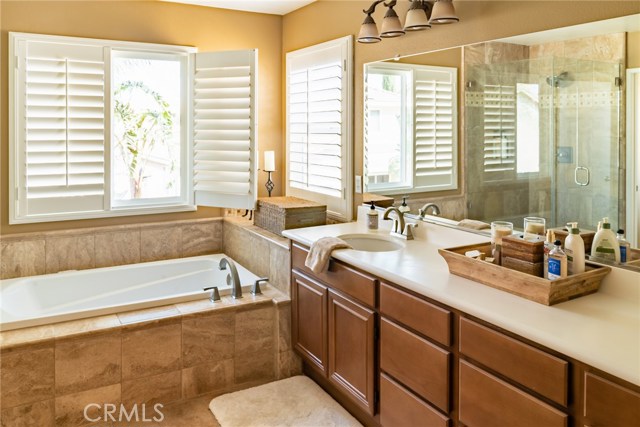 Master bath with custom tile tub and brushed nickel hardware