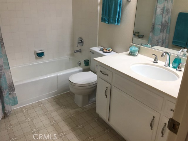 Hall bathroom with tub and shower
