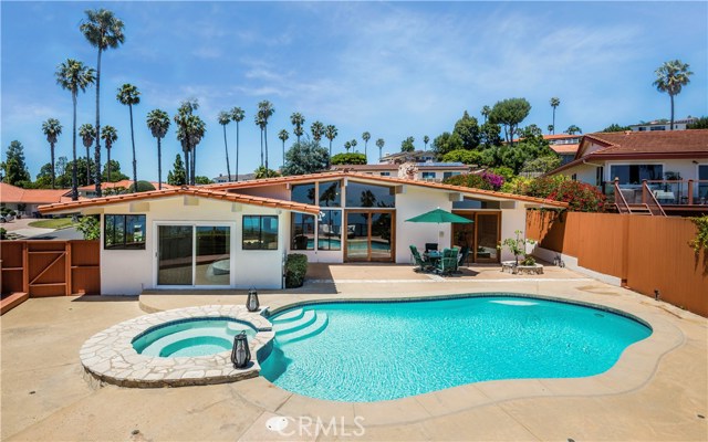 Enjoy the pool and spa while taking in the spectacular view