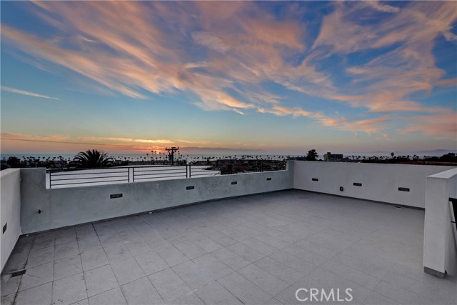 Spectacular sunsets year-round on the oversized rooftop deck. Plumbed and wired.