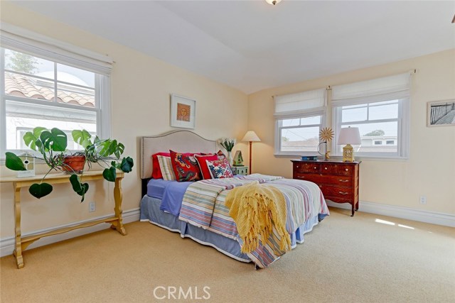 Spacious upstairs guest bedroom.