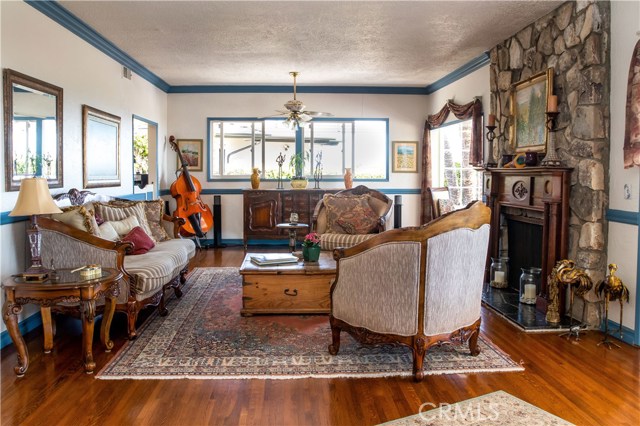 Formal living room with a fireplace